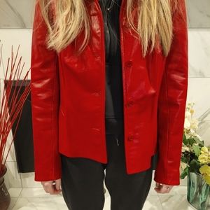 Bright Red Leather Jacket.  I have worn this twice and then "outgrew it".